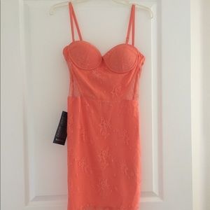 Coral peach Bebe dress Size 4 never worn